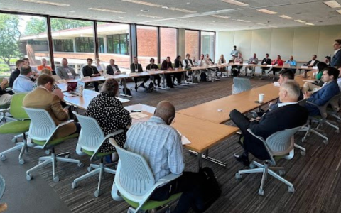 Credit union professionals participating in a peer discussion